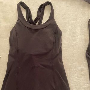 Lululemon sport top, size 6, black in color. There are no pads in this